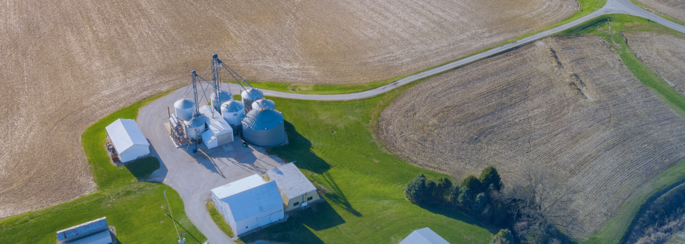 aerial view of conventional farm with bare soil