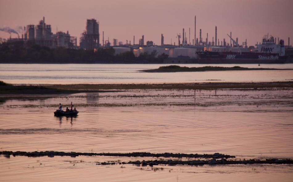 Polluted water next to refinery