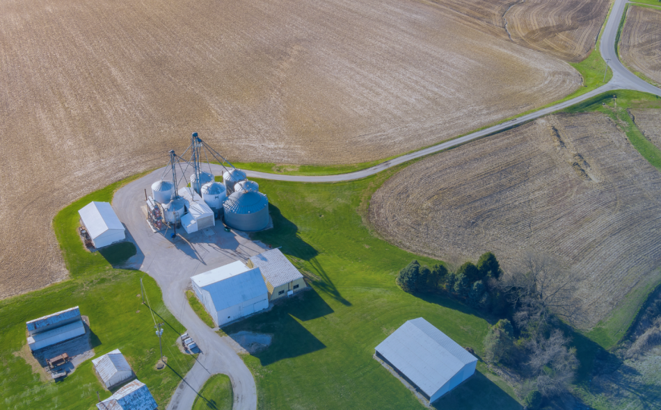 aerial view of conventional farm with bare soil