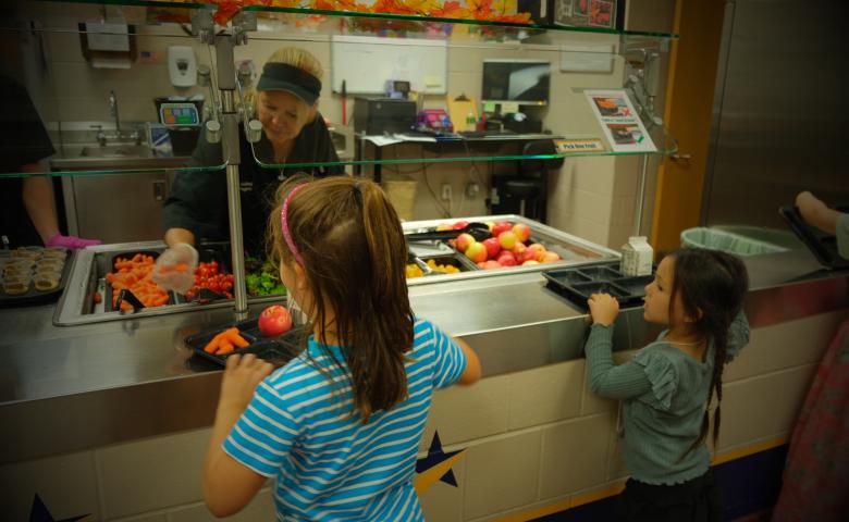 Children in line for local foods at their school cafeteria.